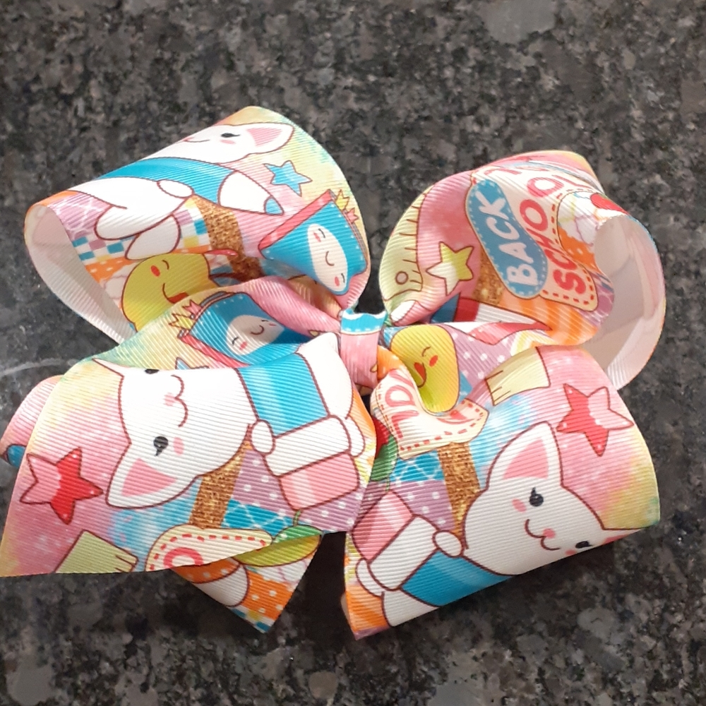 Boutique style bow. Back to school print on ribbon